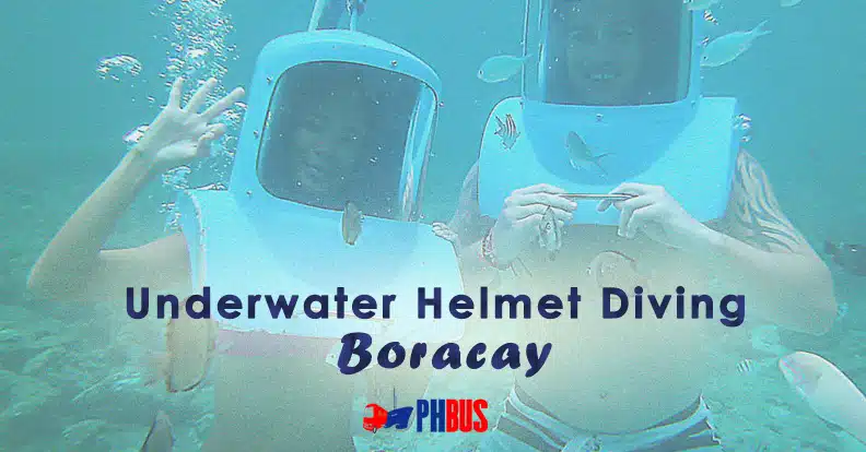 Man and woman helmet diving in Boracay
